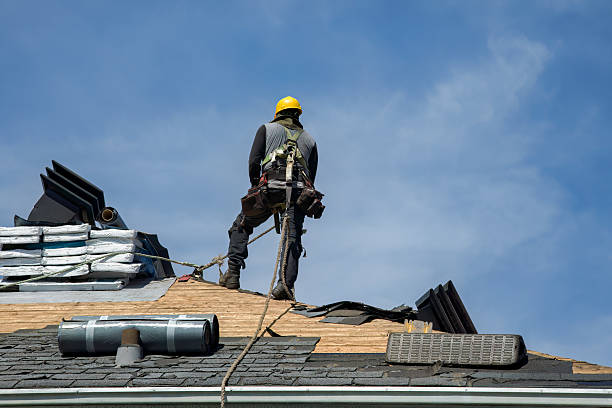 Professional Roof Replacement technician working in East Nassau, NY